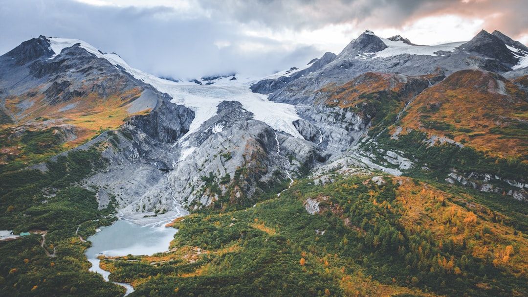 Snow-covered mountains above a lake